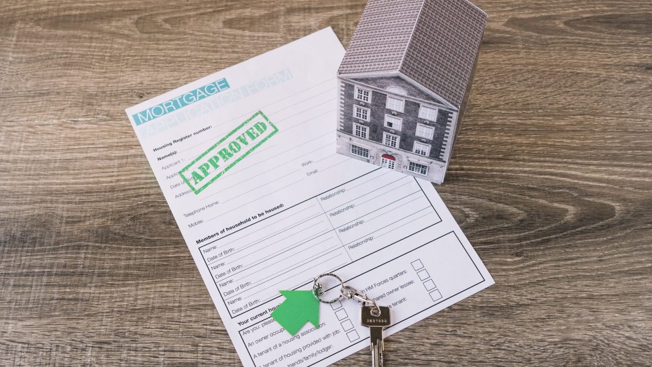 Approved property finance application form on a desk
