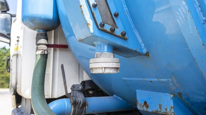 Septic pumping truck, side view of the vacuum tank body