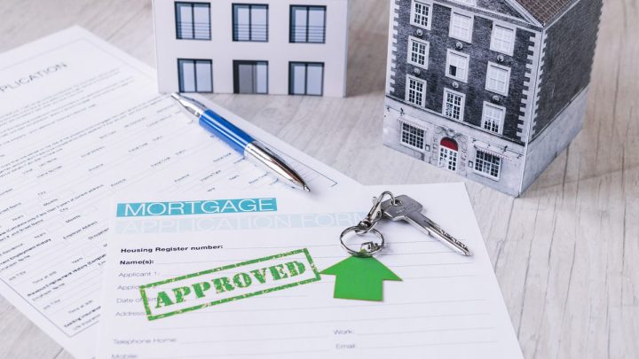 House keys arranged on top of property documents